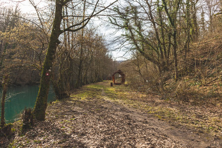 Mountain path and wooden pavillions for relaxing around Slunjcica river stream, passing through the mountain forestの写真素材