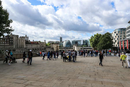 London, England -August 9th, 2018: London city waterfront crowded with people sightseeing around famous city landmarks and attractionsのeditorial素材