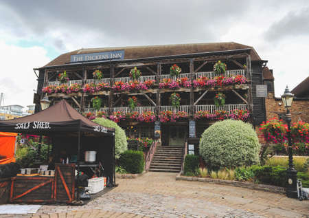 London, England -August 9th, 2018: Beautiful, old, traditional english pub Dickens Inn, located in...