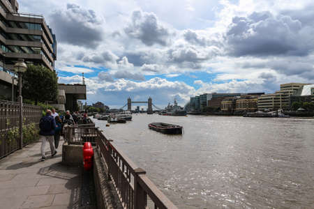 London, England -August 10th, 2018:Beautiful London city Thames river waterfront, with view on some of the most known british landmarks such as Tower Bridge in the distanceのeditorial素材