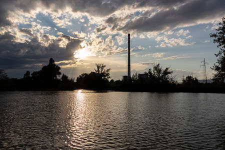 Wondeful summer sunset over fishing lakes and ponds in the eastern part of Zagreb city, near the heating plant of Savica lakesの写真素材
