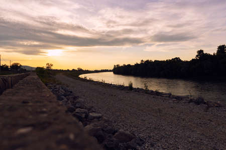 Colorful sunset over Sava river at the village of Medsave, near the Zagreb city, Croatiaの写真素材