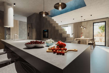 3D rendering of modern, contemporary villa interior with kitchen island connected to the dining roomの写真素材