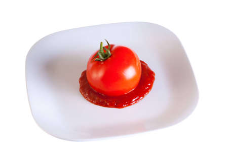 Tomato being smashed into ketchupの写真素材