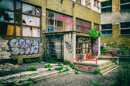 Entrance to abandoned hospital on Bezrucova street in Bratislava, Slovakia. Analog photo look of urban scene.のeditorial素材
