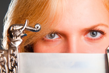 Large portrait of the blonde with a knifeの写真素材