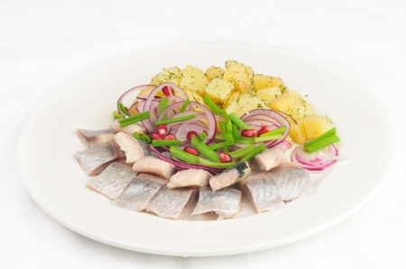 Boiled potato with a herring and an onions の写真素材