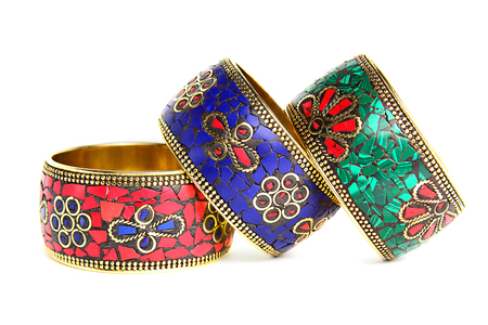 Three bracelets white background. Blue, red and green bracelets in the folk styleの写真素材