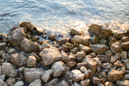 Sea stones at sunrise on the Black sea in Crimeaの写真素材