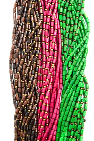 wooden beads thread on a white backgroundの写真素材