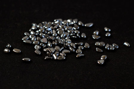 Hematite mineral texture as nice natural texture background on black cloth close upの写真素材