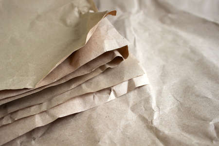 Flat lay group of craft papers texture. Crumpled paper background, close up top view