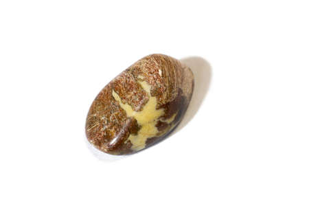 Green and multicolored jasper polished tumblestones narrow focus line, shallow depth of field macrophoto front viewの写真素材