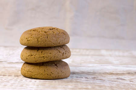 Tasty homemade cookies on white wooden background close up Narrow focus line, shallow depth of fieldの写真素材