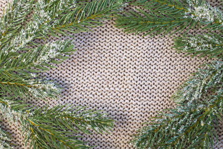 Beautiful blue Christmas garland with copy space on cozy light textured background, close up close up Selective focusの写真素材
