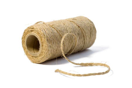 Skein of jute twine Natural jute twine, macro shot. Jute thread texture isolated on white background...