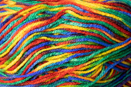 Balls of colorful yarn as nice background. Threads of wool boho image. Space for text. Good for...