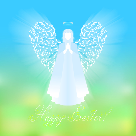 Angel with ornamental white wings and glowing nimbus. Beautiful angel silhouette with delicate wings. Happy Easter calligraphy text on a background of sky and green abstract background.のイラスト素材