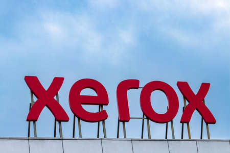 Almaty, Kazakhstan - July 15, 2021: The name of the American corporation Xerox 3D in letters on the roof of the building. Against the skyのeditorial素材