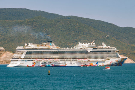 Nha Trang, Vietnam - April 16, 2019: Cruise ship in the South China Sea. On the background of the mountain.のeditorial素材