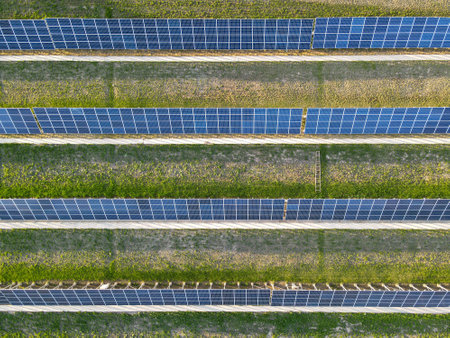 Four rows of solar panels. view from the droneの写真素材