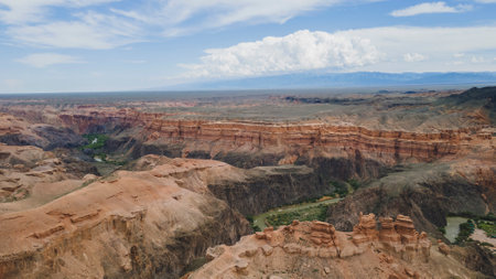A view of a large canyon with a winding river in the gorge.の写真素材