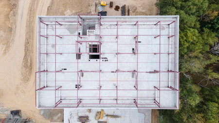 The roof of a building under construction is made of monolithic concrete. View from above