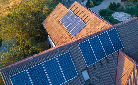 Photovoltaic modules on the roof of a house from different sides. Green energy