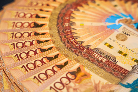 Fanned out 1000 tenge banknotes. Paper money from circulation
