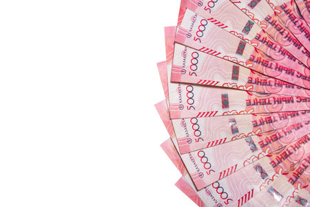 Fan of 5000 tenge banknotes on a white background. Paper money from circulationの写真素材