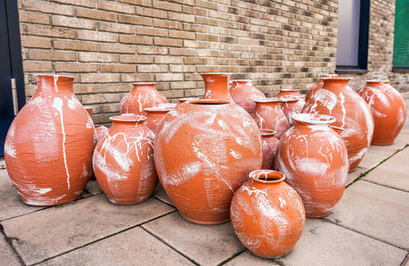 Clay jugs with modern design in different sizes and shapes. Craftの写真素材