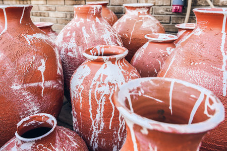 Necks of painted clay jugs of different sizes. Craftの写真素材