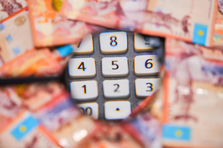 Calculator buttons in magnifying glass. Financial report