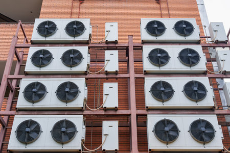 Chillers installed on the facade of the building. Cooling systemの写真素材