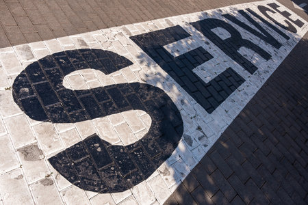 Service sign on the floor tile. Repair and maintenanceの写真素材