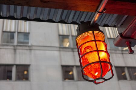 caged protected construstiion site light
