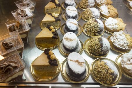 fresh sweet deserts in a row 
