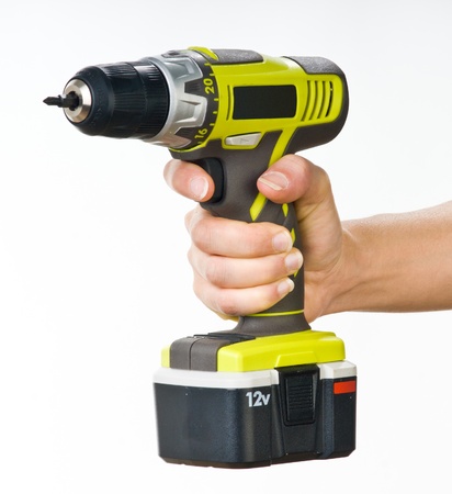 hand with electric screwdriverの写真素材