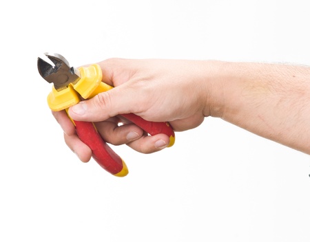 hand with cutting pliers