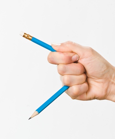 hand with broken pencilの写真素材