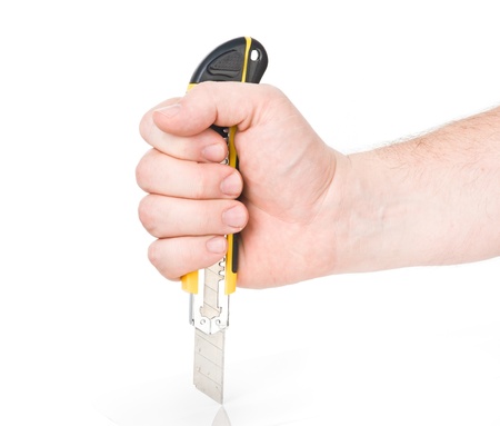 hand with cutterの写真素材