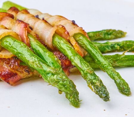 asparagus with bacon fresh friedの写真素材