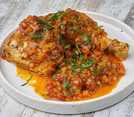 chicken with vegetables with sauceの写真素材