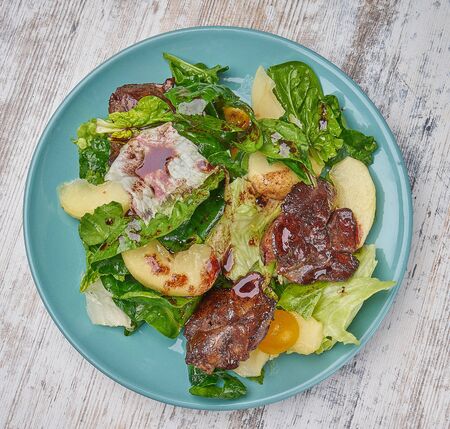 chicken kidney warm salad with greens and avocadoの写真素材
