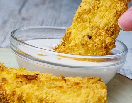 chicken nuggets with sauce homemadeの写真素材