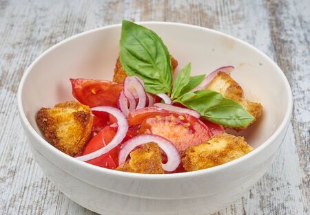 panzanella tomato salad with crumblesの写真素材