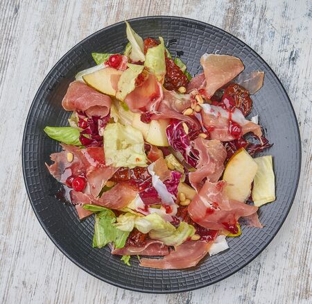 prosciutto salad with sun-dried tomatoesの写真素材
