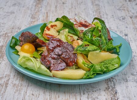 chicken kidney warm salad with greens and avocadoの写真素材