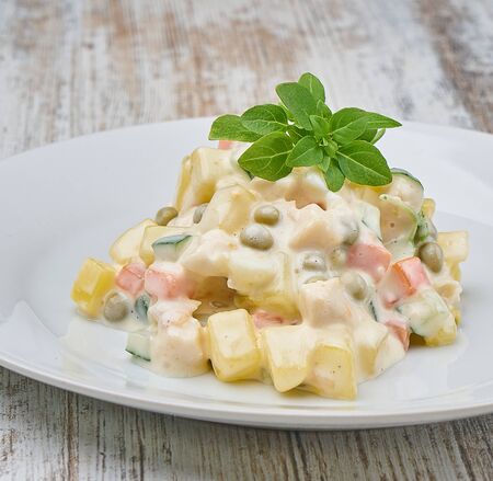 russian salad olivier with homemade mayonnaise sauceの写真素材