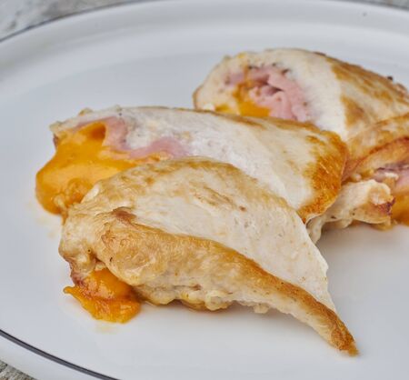 chicken breast sliced stuffed with sauceの写真素材